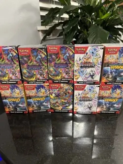 POKEMON TCG BOOSTER BUNDLE X10 PRISMATIC EVOLUTIONS MEGA PHANTASMAL SURGING - Image 1