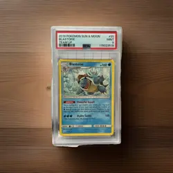 2019 POKEMON SUN & MOON TEAM UP #25 BLASTOISE PSA 9 - Image 1