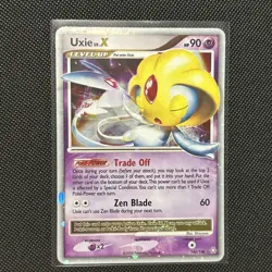 Uxie LV.X 146/146 Legends Awakened Holo LP Pokemon card - Image 1