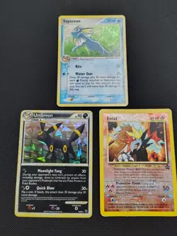 Pokemon TCG Holo Lot of 3 *Damaged* Umbreon, Vaporeon, and Entei - Image 1