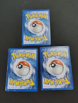 Pokemon TCG Holo Lot of 3 *Damaged* Umbreon, Vaporeon, and Entei - Image 2
