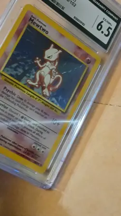 Pokemon TCG Mewtwo 10/102 Base Set Holo Rare 1999 CGC 6.5 Card Stock - Image 4