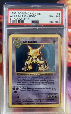 1999 POKEMON BASE SET SHADOWLESS #1 ALAKAZAM-HOLO PSA 8 - Image 1