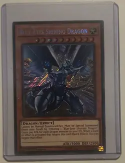 Yu-Gi-Oh! Blue-Eyes Shining Dragon LCKC-EN008 1st Edition Secret Rare - Image 1