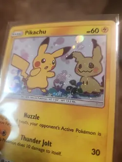 Pikachu SM162 Playing Ball With A Big Swirl Black Star Promo - Image 1