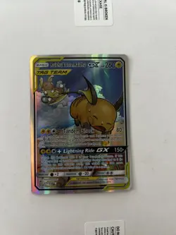 Pokemon TCG Raichu & Alolan Raichu-GX 221/236 English Near Mint Mint - Image 1