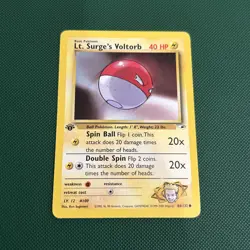 Pokemon TCG Lt. Surge’s Voltorb Gym Heroes 84/132 Regular 1st Edition NM - Image 1