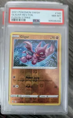 PSA 8 NM-MT 2021 POKEMON SWORD & SHIELD FUSION STRIKE #140 GLIGAR-REV.FOIL - Image 1
