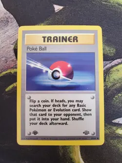 1x Poke Ball 1st Edition Jungle 64/64 Pokemon Card Near Mint - Image 1