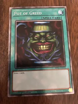 Yu-Gi-Oh! TCG Pot of Greed MP25-EN050 2025 Mega-Pack 1st Edition Starlight Rare - Image 1