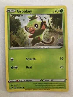 Grookey 011/202 (Premium Collection) Holo Promo Mint Pokemon Card - Image 1