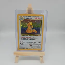 1999 Pokemon TCG Fossil 4/62 Dragonite Holo Card raw - Image 1