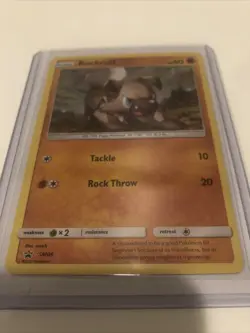 Pokemon TCG Rockruff SM Black Star Promo SM06 Holo Promo Lightly Played - Image 2