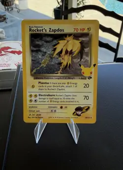Team Rockets Zapdos 2021 Celebrations 25th Anniversary Holo 15/132 Pokemon NM - Image 1