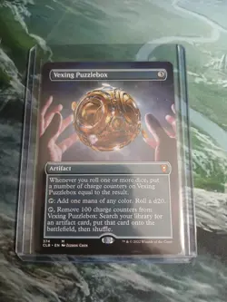 Vexing Puzzlebox (Borderless) CLB Regular Mythic #374 NM MTG - Image 1