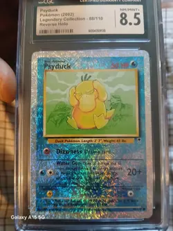 CGC 8.5 Psyduck 2002 Legendary (Collection) 88/110 Reverse Holo Pokemon Card - Image 1