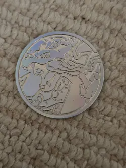 Pokemon Metal Coin - Mega Charizard X from UPC - Image 1