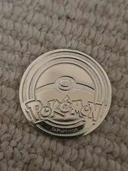 Pokemon Metal Coin - Mega Charizard X from UPC - Image 2