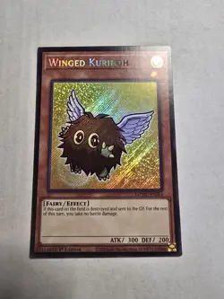 Yugioh! 1x Winged Kuriboh MZMU-EN064 Secret Rare 1st Ed NM - Image 1