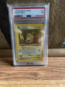 1999 Pokemon TCG Raichu Holo Rare Fossil PSA 7 - Image 1