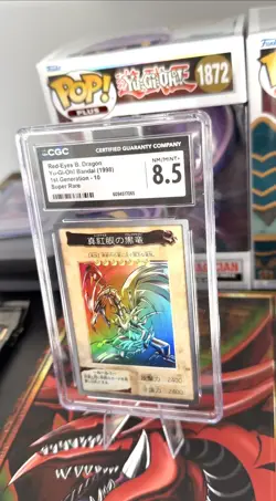 1998 YU-GI-OH! JAPANESE 1ST GENERATION SUPER RARE RED-EYES BLACK DRAGON CGC 8.5 - Image 1