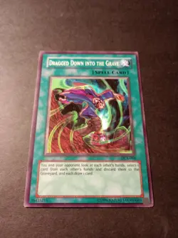 Yu-Gi-Oh! Dragged Down To The Grave Common Spell Card DCR-084 LP - Image 1