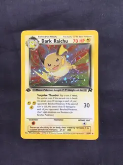 Pokemon Cards: Team Rocket 1st Edition Rare Holo: Dark Raichu 83/82 - Image 1
