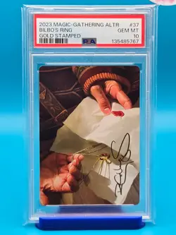PSA 10 - 2023 MAGIC: THE GATHERING LOTR ART SERIES 37 BILBO'S RING GOLD STAMPED - Image 1