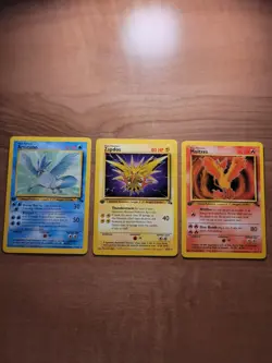 Pokemon TCG 1st Edition Vintage Fossil Articuno, Zapdos, And Moltres - Image 1
