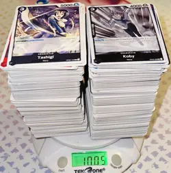 ONE PIECE LOTTO 1KG DI CARTE OP-02 PARAMOUNT WAR ENGLISH CON DOPPIE-FOIL NM/MT! - Image 1