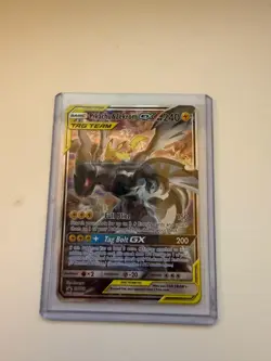 Pokemon Pikachu & Zekrom GX SM168 Sun & Moon Team Up Promo - Heavy Play - Image 1