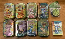 Prismatic Evolutions - EMPTY - Mini Tin Complete Set Of 8 (Tin + Card + Coin) - Image 1