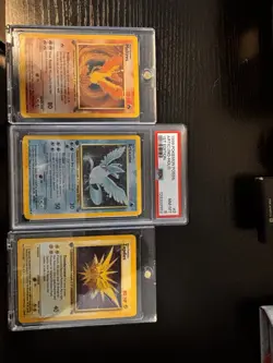 Pokemon TCG Zapdos, Moltres, Articuno (PSA 8) 1st Edition Base Set/Fossil - Image 1