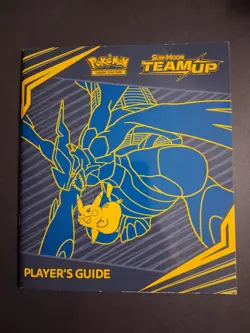 Scuffed Sun & Moon Team Up Pokemon TCG Elite Trainer Players Guide Book - Image 1