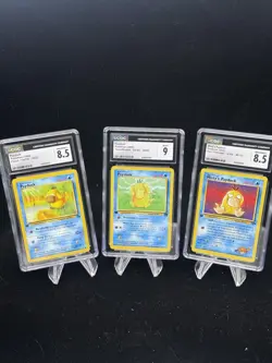 Psyduck 65 53 90 1st Edition Fossil Gym Rocket 2000 Pokemon CGC 8.5 - 9 💦 - Image 1