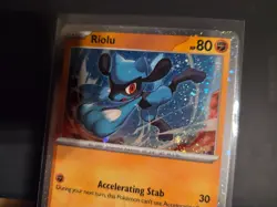 Riolu 076/132 Cosmos Holo Mega Evolution Promo Pokemon Card w/ FULL SWIRL 🌀 - Image 1