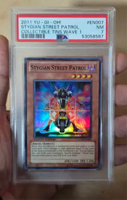 2011 YUGIOh Collectible Tins Wave 1 CT08-EN007 Stygian Street Patrol PSA 7 NM - Image 1