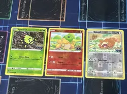 Pokemon TCG (Set of 3) Unpeeled Ditto Pokemon GO Spinarak Numel Bidoof NM-LP - Image 1