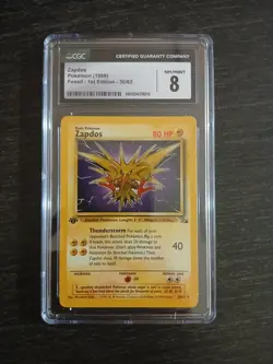 CGC 8 1st Edition Zapdos 2000 Fossil 30/62 1999-2000 Pokemon Card - Image 1