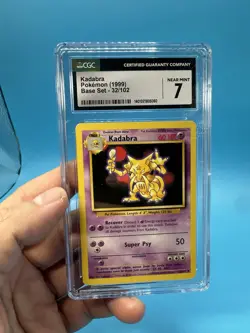 KADABRA 32/102 POKEMON 1999 BASE SET CGC 7 NEAR MINT - Image 1