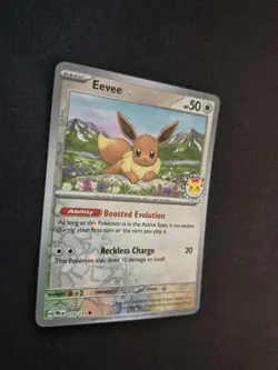 Eevee 074/131 Pokemon Day 2025 Stamped Cosmos Holo Promo Prismatic Evolutions - Image 2