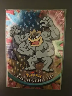 Machamp #68 - BLACK Logo - TEXTURED HOLO - SERIES 1 - TOPPS Pokemon Card - Image 1