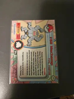 Machamp #68 - BLACK Logo - TEXTURED HOLO - SERIES 1 - TOPPS Pokemon Card - Image 2