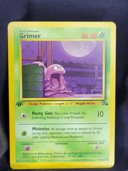 Pokemon TCG Grimer Fossil, 1st Edition Common Card 48/62 NM/LP Condition - Image 1