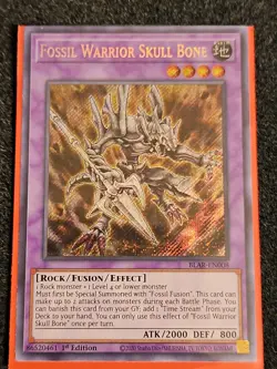 NM Fossil Warrior Skull Bone - BLAR-EN008 - Secret Rare - 1st Edition Yu-Gi-Oh! - Image 1
