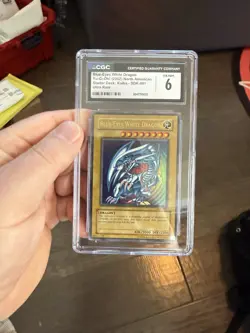 2002 Yugioh Blue Eyes White Dragon SDK-001 Ultra Rare Holo CGC 6 - Image 1
