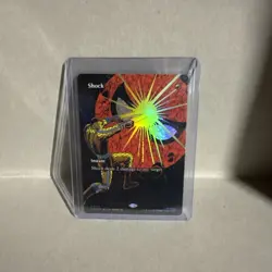 MTG Shock (Borderless) Marvel Universe Eternal-Legal Foil - Image 1