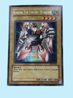GAMMA THE MAGNET WARRIOR, PRISMATIC SECRET RARE • DOR-003, NM, YU-GI-OH - Image 1
