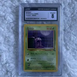 Pokemon 1999 Fossil Unlimited Grimer 48/62 CGC 8 - Image 1