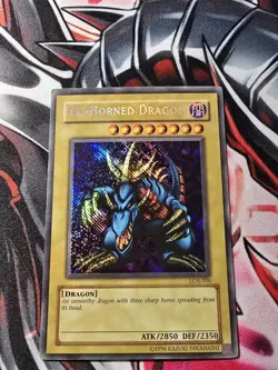 Yu-Gi-Oh! TCG Tri-Horned Dragon LOB-000 Secret Rare Unlimited Edition - LP - Image 1